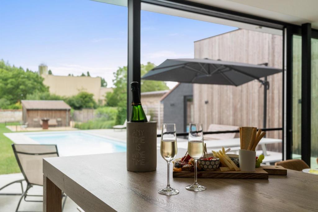 Nápoje v ubytování Maison Arthur vakantiewoning met verwarmd zwembad