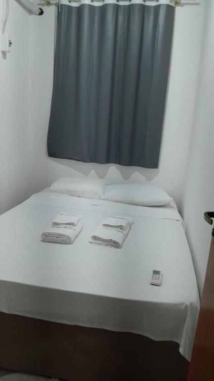 Postel nebo postele na pokoji v ubytování Hotel Porto da Lua Belém