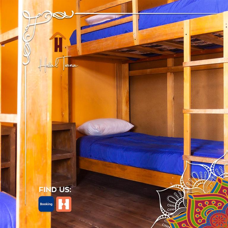 Postel nebo postele na pokoji v ubytování Hostal Café Tiana