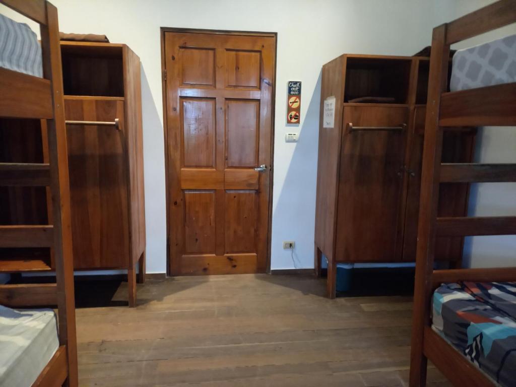 Postel nebo postele na pokoji v ubytování Pagalù Hostel
