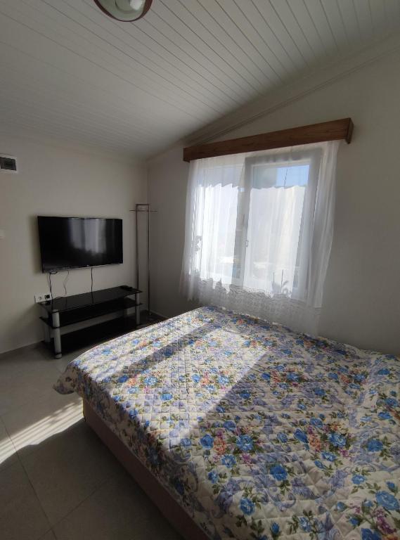 Postel nebo postele na pokoji v ubytování Villa Rain Cesme