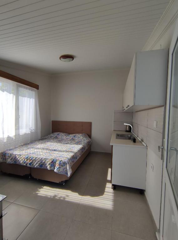 Postel nebo postele na pokoji v ubytování Villa Rain Cesme