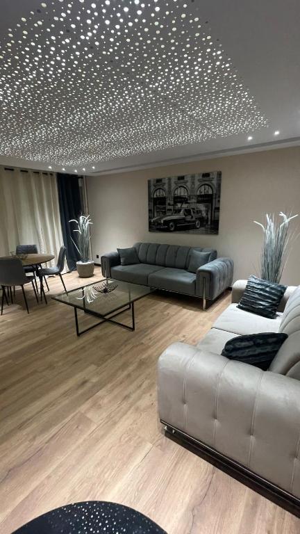 Zona d'estar a Luxe home