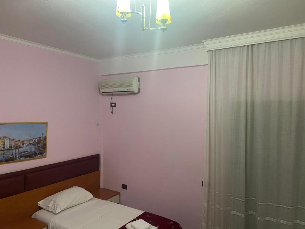 Postel nebo postele na pokoji v ubytování Hotel Edland