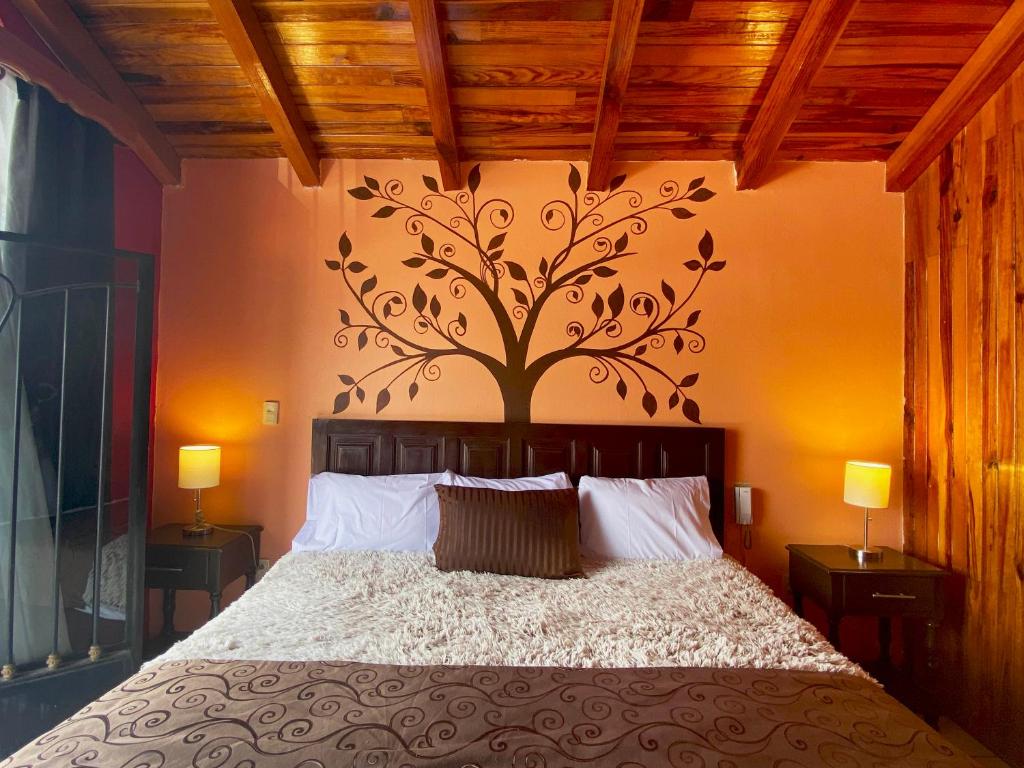 Postel nebo postele na pokoji v ubytování Hotel Real de la Sierra