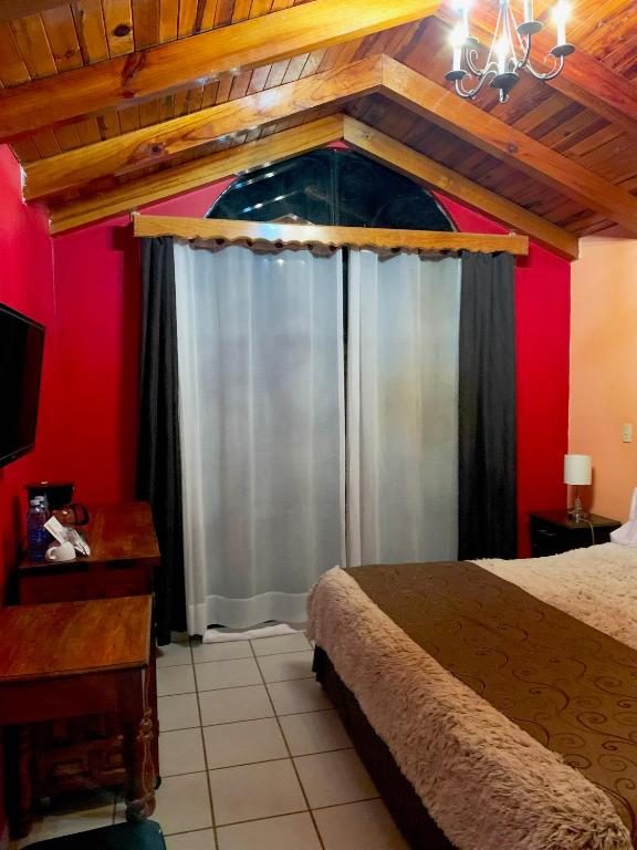 Postel nebo postele na pokoji v ubytování Hotel Real de la Sierra