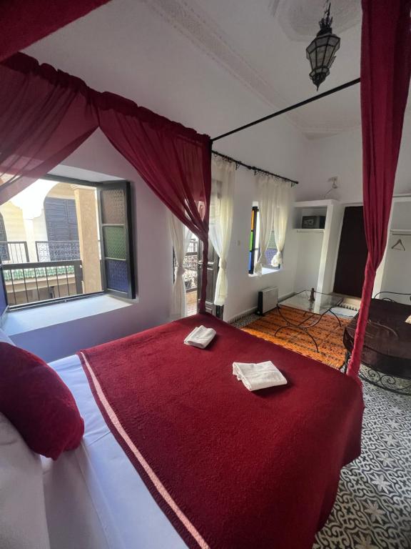 Postel nebo postele na pokoji v ubytování Riad Ago
