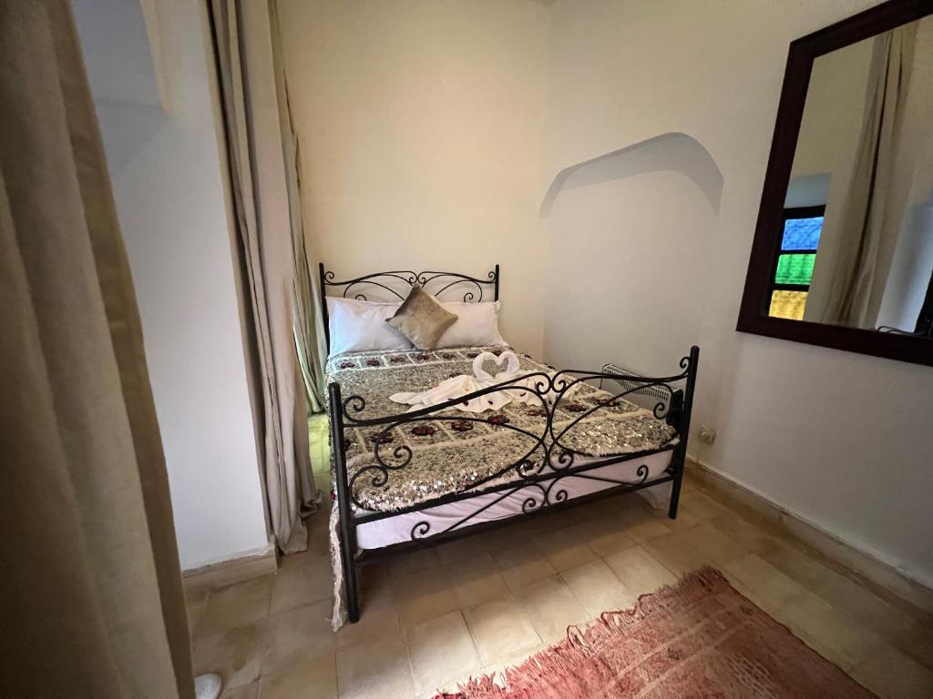 Postel nebo postele na pokoji v ubytování Riad Ago