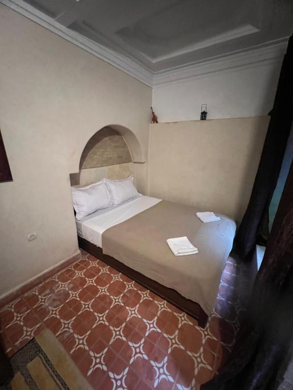 Postel nebo postele na pokoji v ubytování Riad Ago