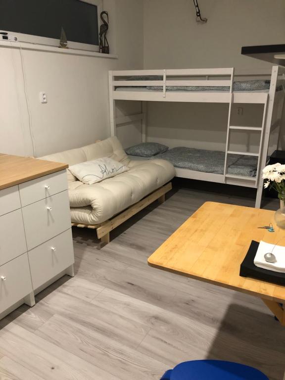 Postel nebo postele na pokoji v ubytování r E L L A x Studia Chvalovice Hatě na Greenway Praha-Wien