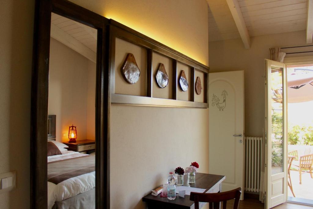 Postel nebo postele na pokoji v ubytování B&B Kapì Country