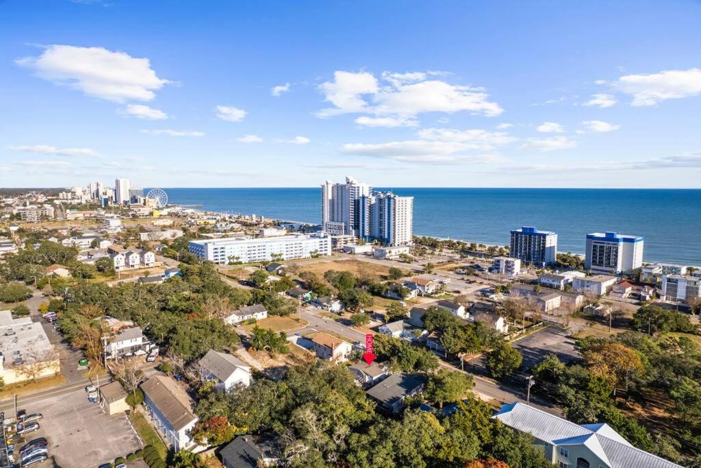 an aerial view of a city and the ocean at Beautiful Centrally Located Beach House w King Bed, Private Hot tub, Yard, Deck & BBQ in Myrtle Beach