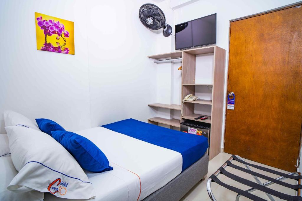 TV a/nebo společenská místnost v ubytování Hotel Casa 10