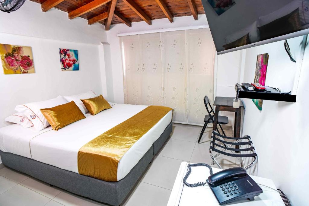 TV a/nebo společenská místnost v ubytování Hotel Casa 10