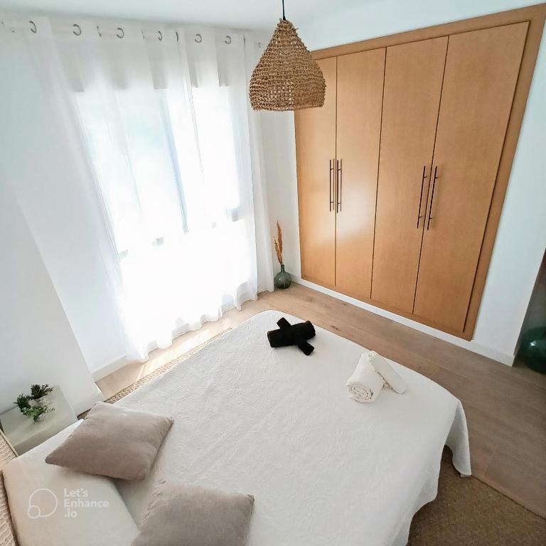 Postel nebo postele na pokoji v ubytování Prendisole Denia con piscina y terraza
