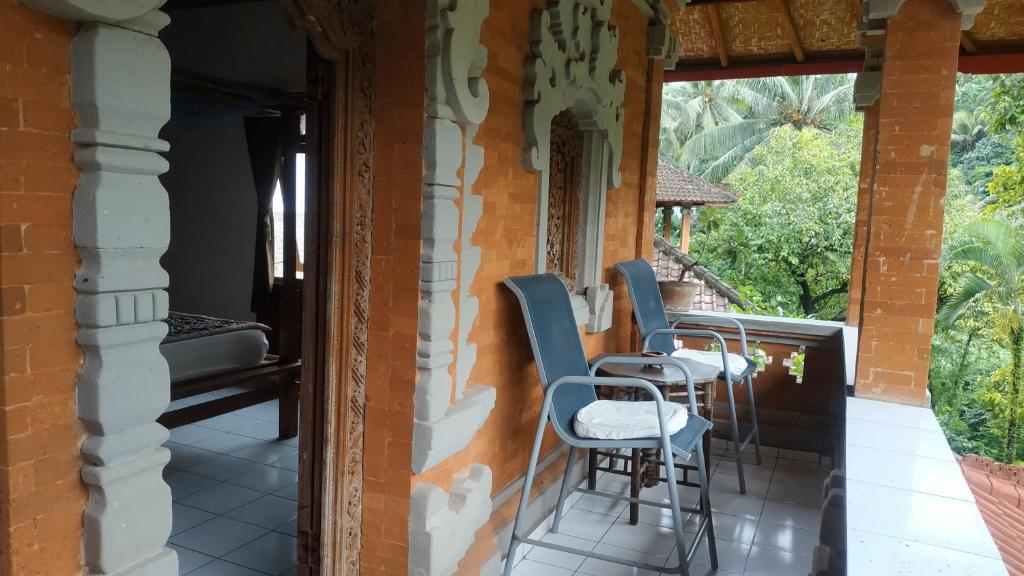 Posezení v ubytování Pondok Wisata Grya Sari