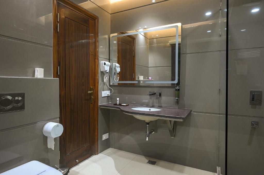 Koupelna v ubytování Hotel Leela Grande
