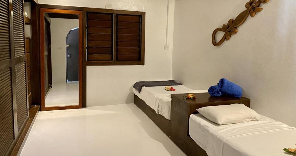 Postel nebo postele na pokoji v ubytování Navutu Stars Resort