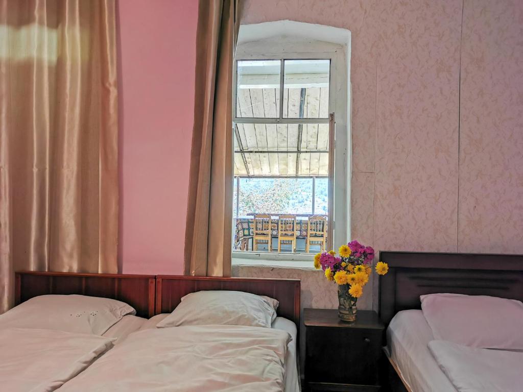 Postel nebo postele na pokoji v ubytování Guest House LALI
