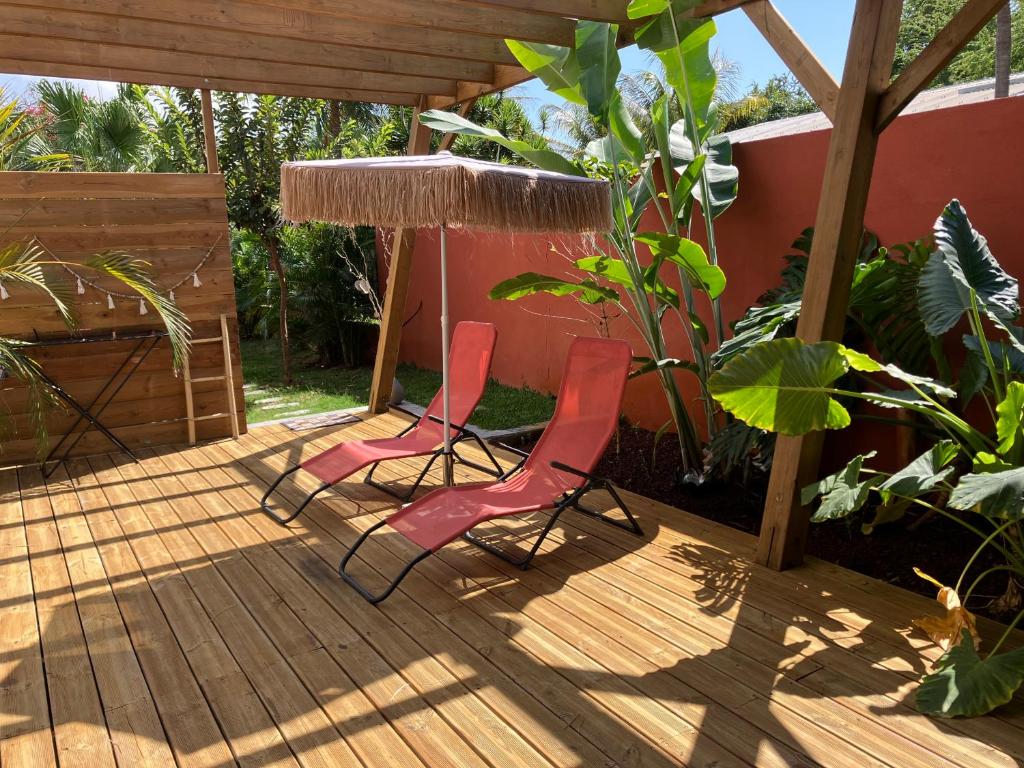Zahrada ubytování KazaCoco Bungalow à 5 min à pieds du lagon
