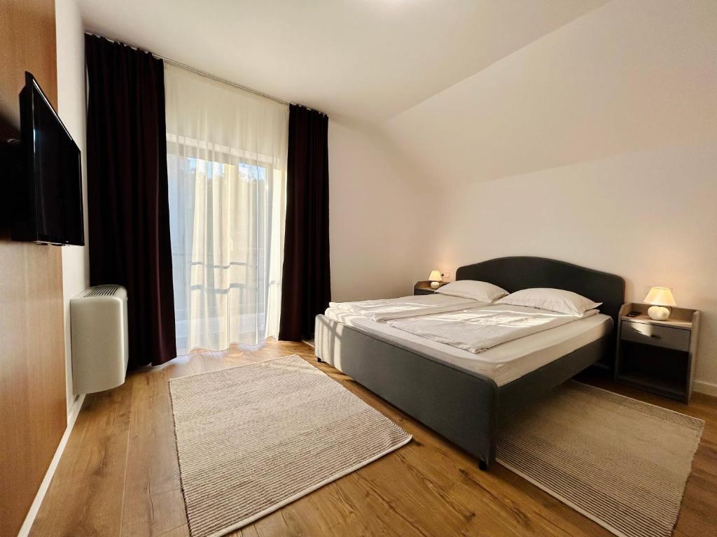 Postel nebo postele na pokoji v ubytování Hermes Guest House