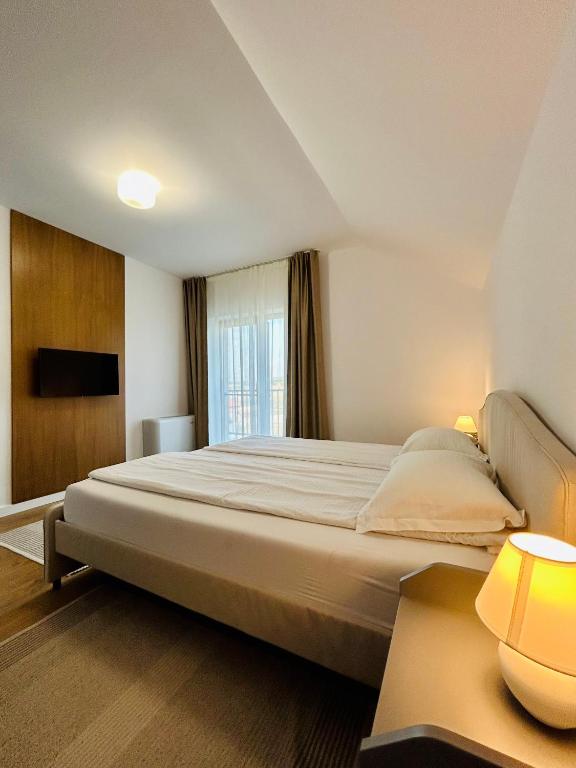 Postel nebo postele na pokoji v ubytování Hermes Guest House