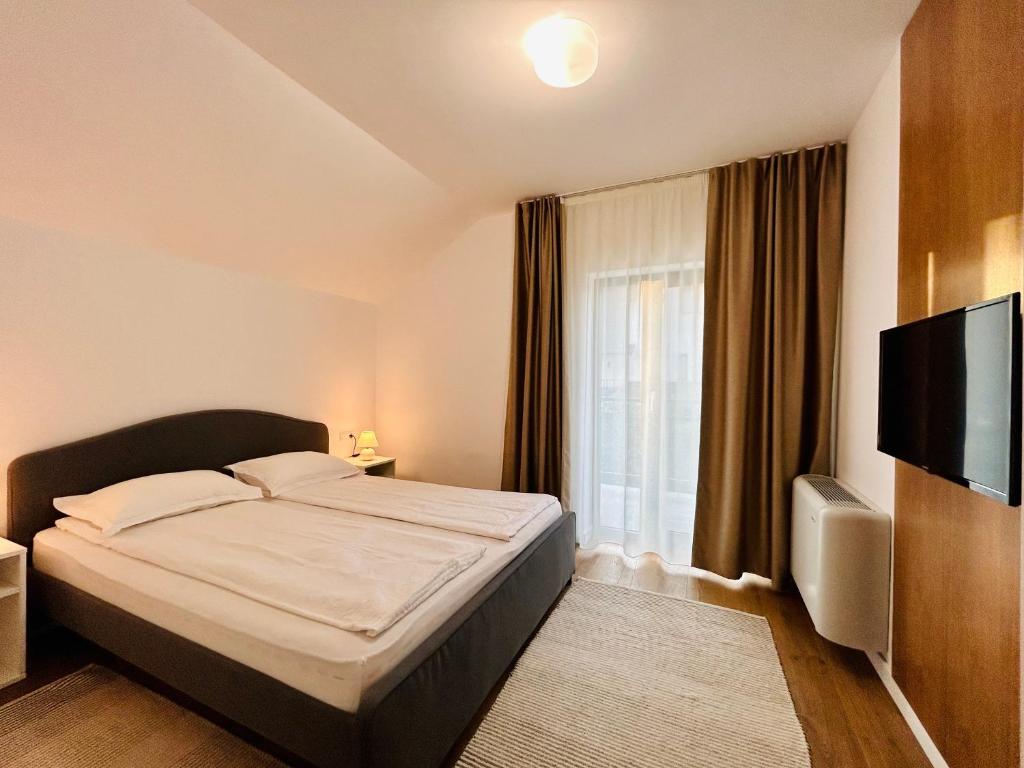 Postel nebo postele na pokoji v ubytování Hermes Guest House