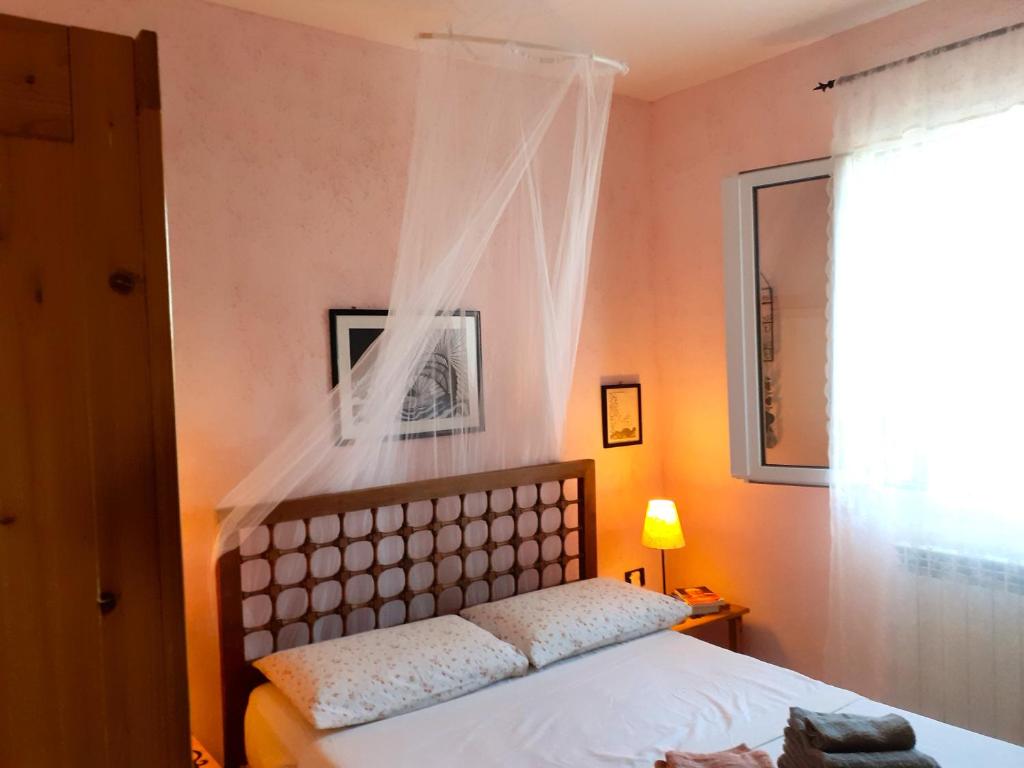 Postel nebo postele na pokoji v ubytování Korés House