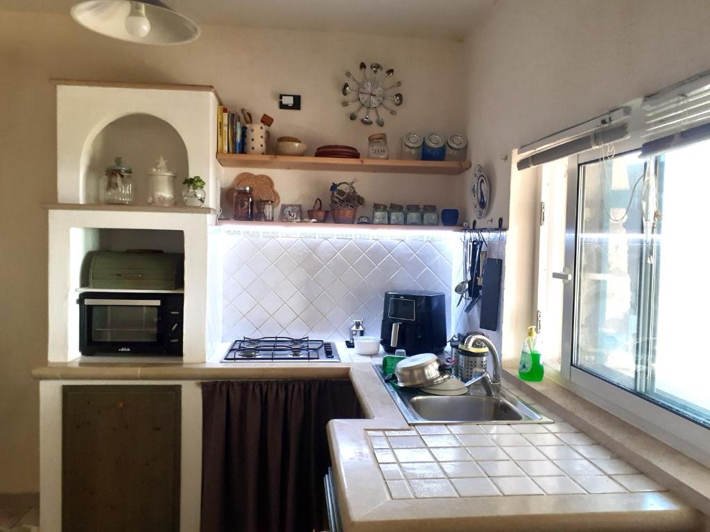 Kuchyň nebo kuchyňský kout v ubytování Korés House