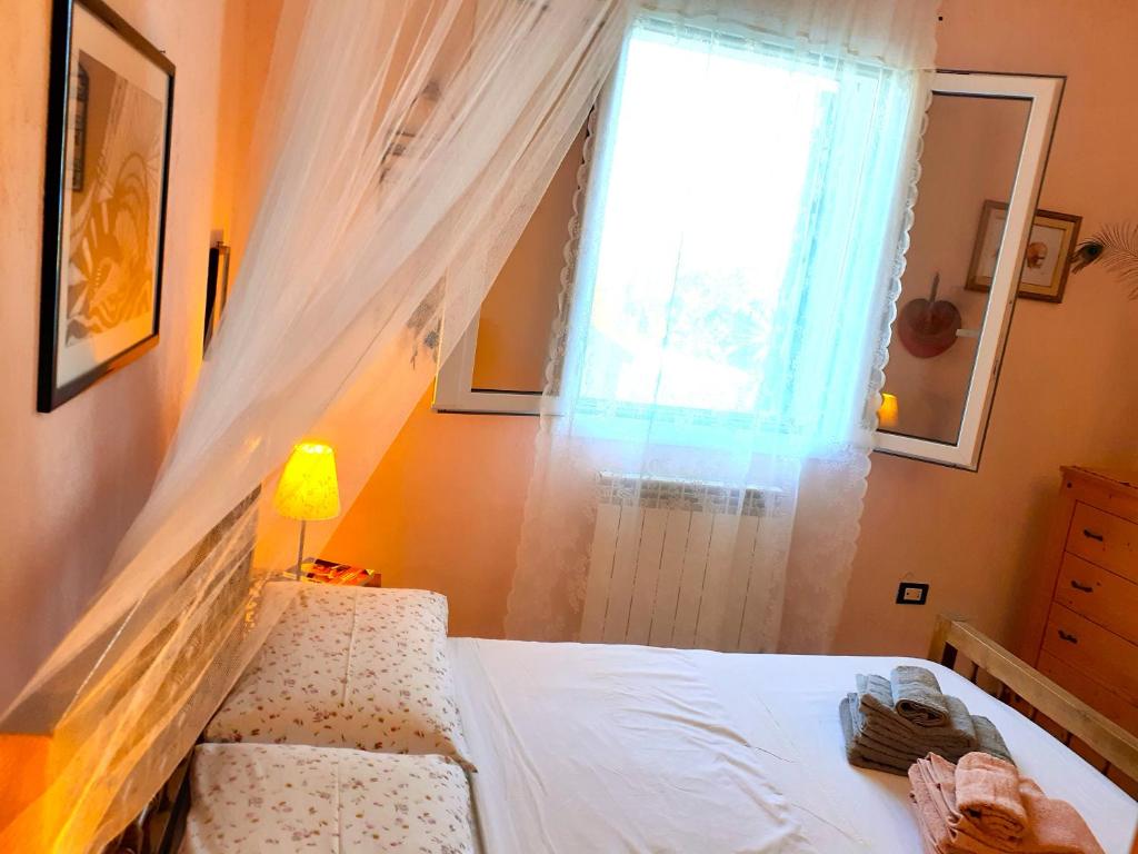 Postel nebo postele na pokoji v ubytování Korés House