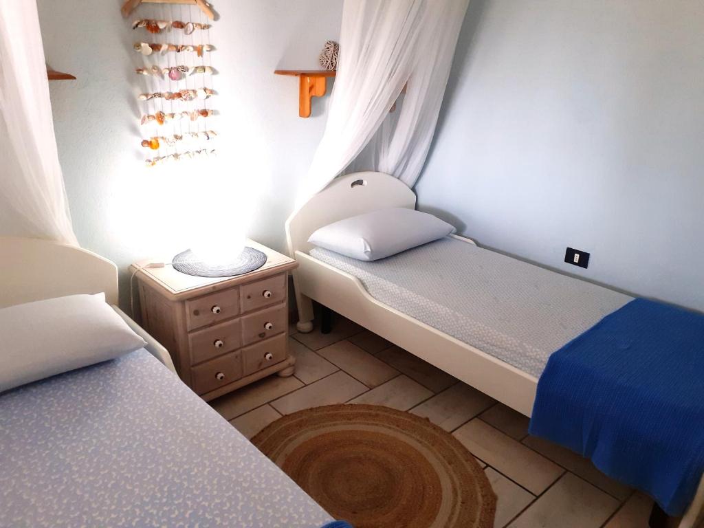 Postel nebo postele na pokoji v ubytování Korés House