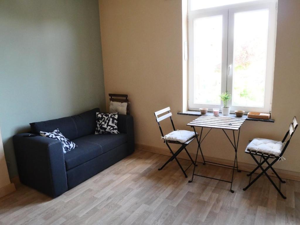 Posezení v ubytování Chambre Fischbach