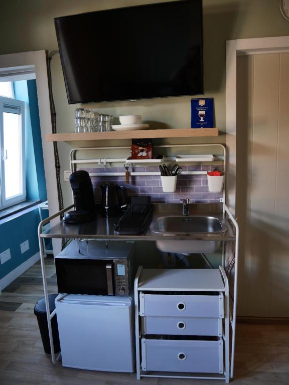 Kuchyň nebo kuchyňský kout v ubytování Chambre Fischbach