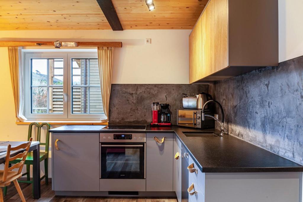 Kuchyň nebo kuchyňský kout v ubytování Chalet Rauschn 2
