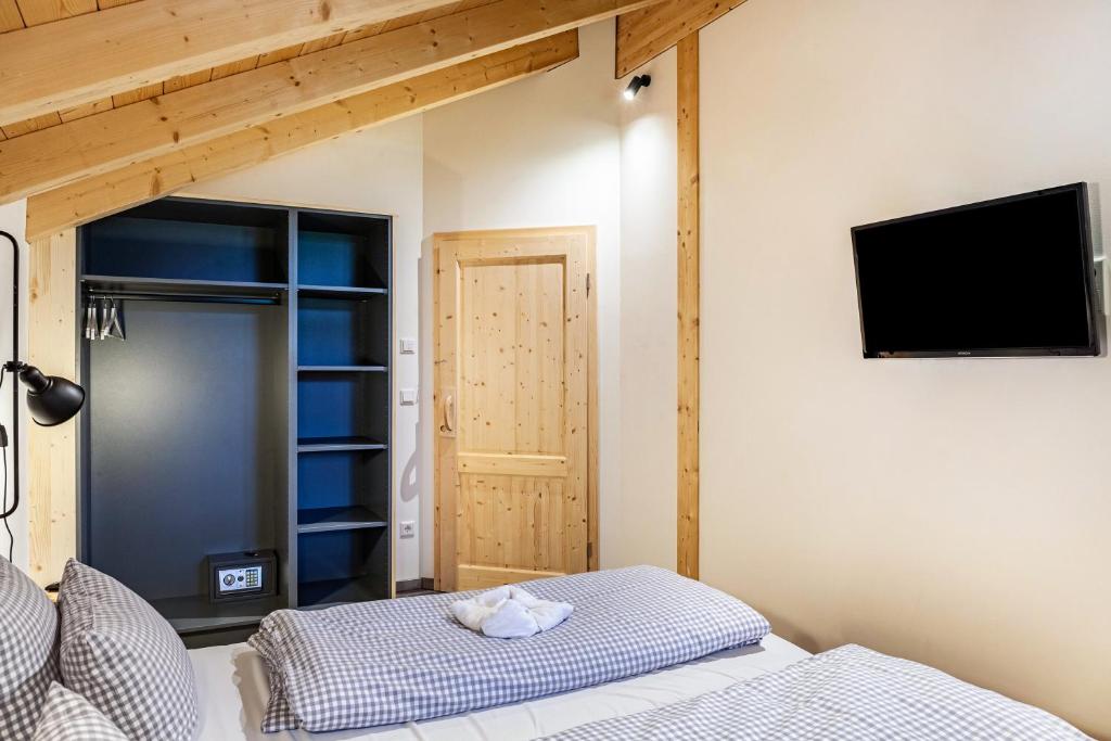 Postel nebo postele na pokoji v ubytování Chalet Rauschn 2
