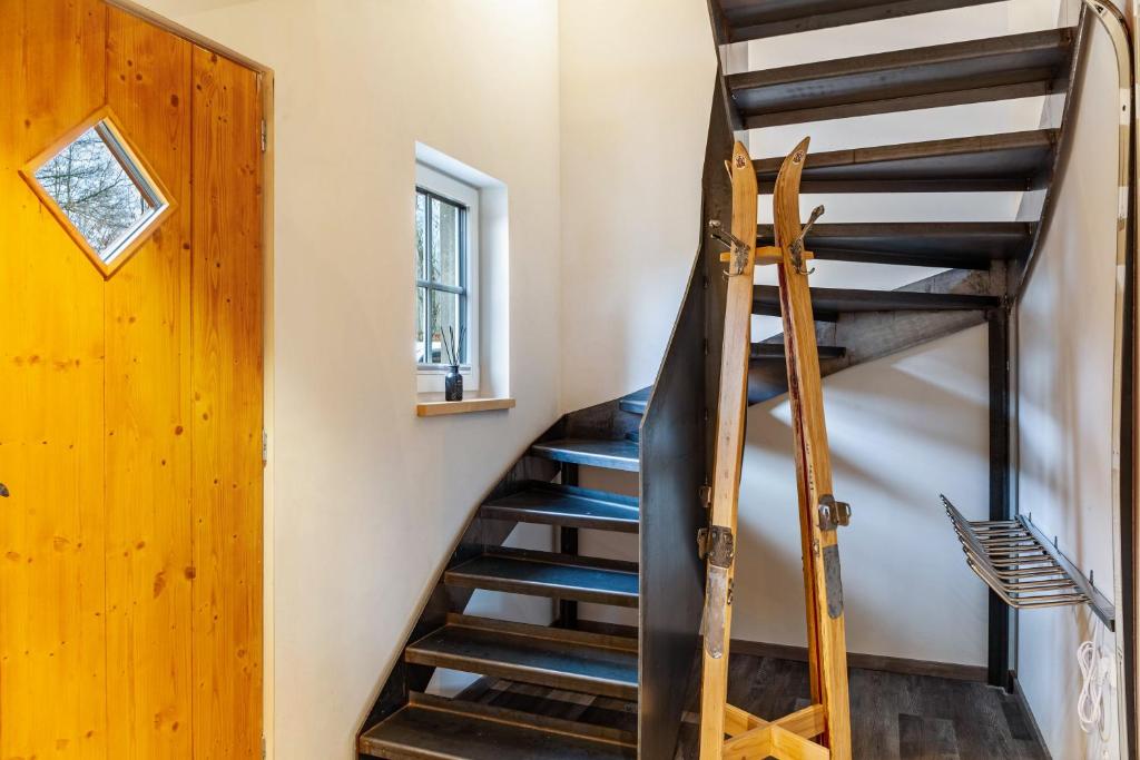 Palanda nebo palandy na pokoji v ubytování Chalet Rauschn 3