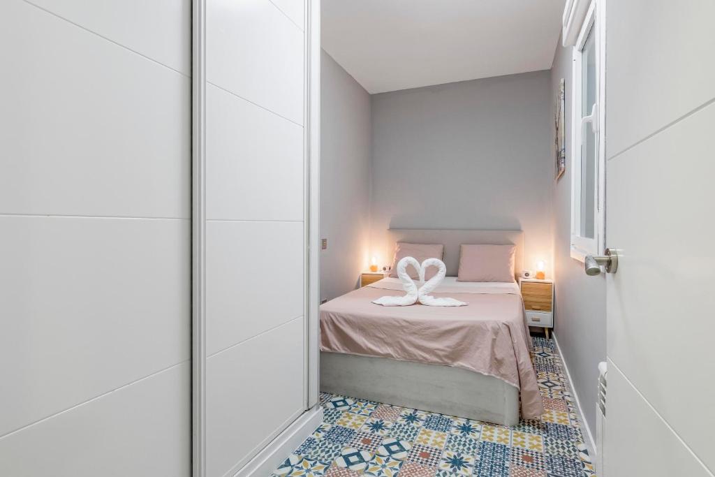 Postel nebo postele na pokoji v ubytování Cerca Santiago Bernabéu - Apartamento TORRE PICASSO