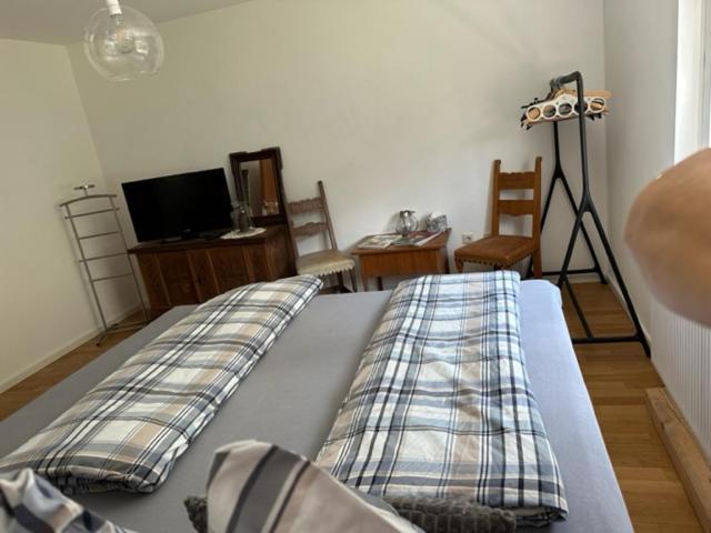 Postel nebo postele na pokoji v ubytování Ferienwohnung Christine am Weissenbach