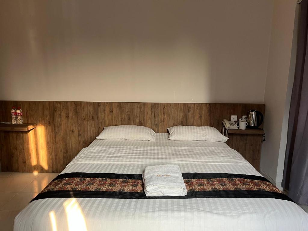 Postel nebo postele na pokoji v ubytování CVS The Hotel
