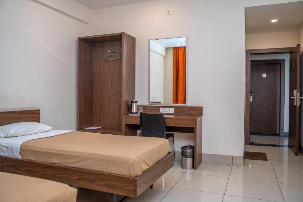 Postel nebo postele na pokoji v ubytování Hotel Dreamland