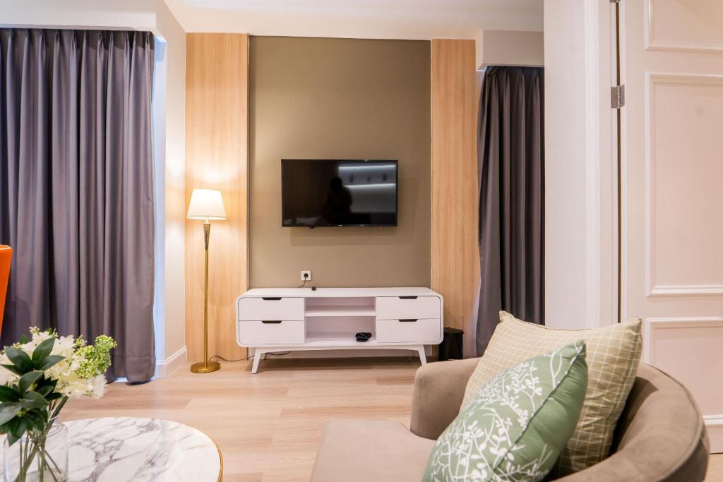 TV a/nebo společenská místnost v ubytování The Difan Hotel