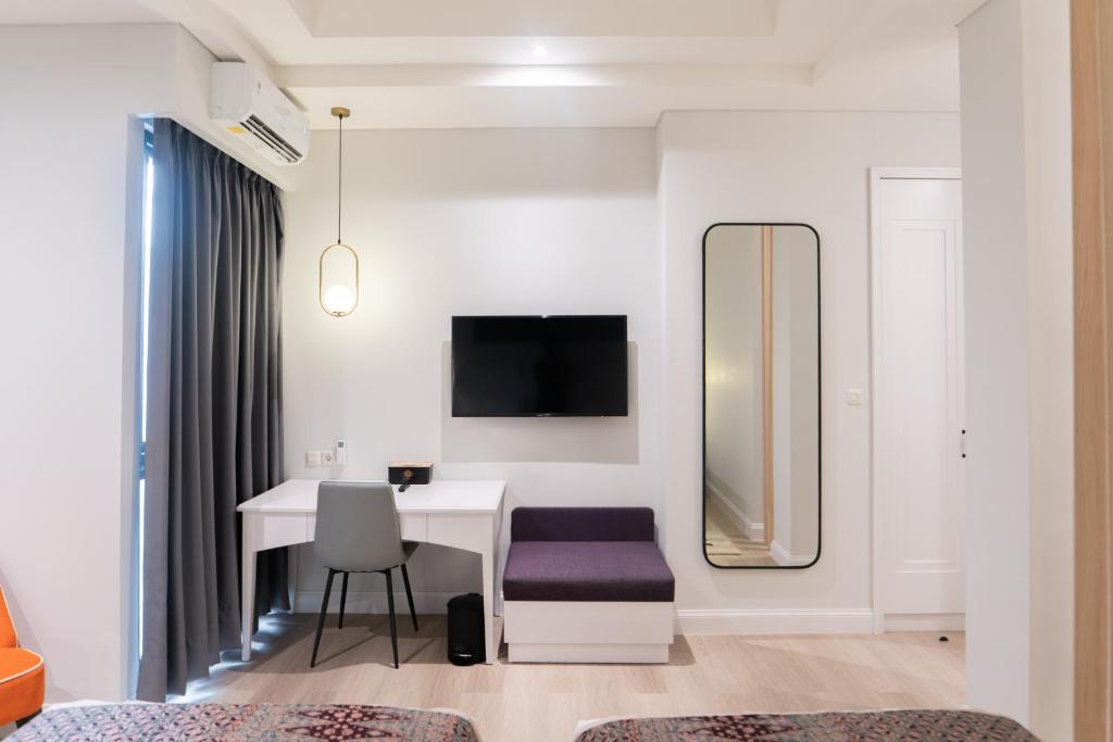 TV a/nebo společenská místnost v ubytování The Difan Hotel