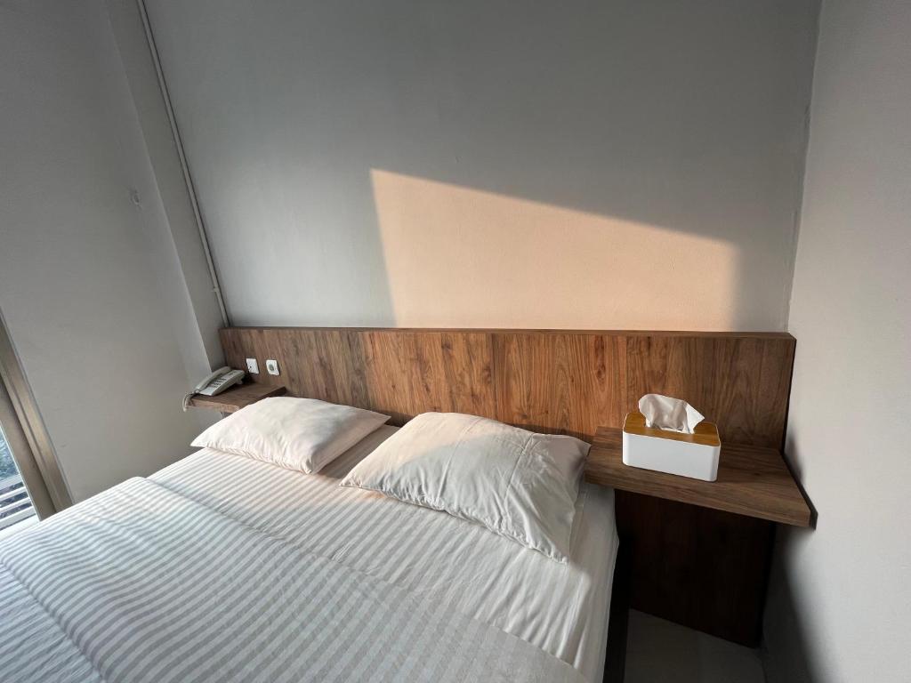 Postel nebo postele na pokoji v ubytování CVS The Hotel