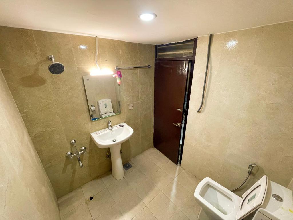 Koupelna v ubytování Hotel Lotus Grand Pvt Ltd