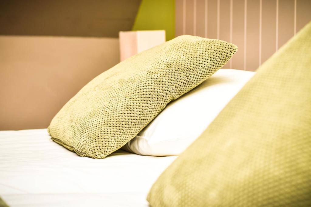 Postel nebo postele na pokoji v ubytování B&B Fruithof Tack