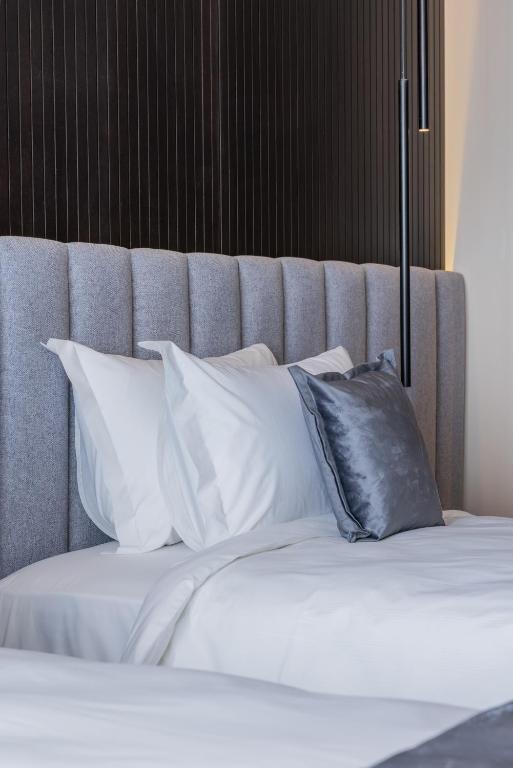 Postel nebo postele na pokoji v ubytování Derand Hotel