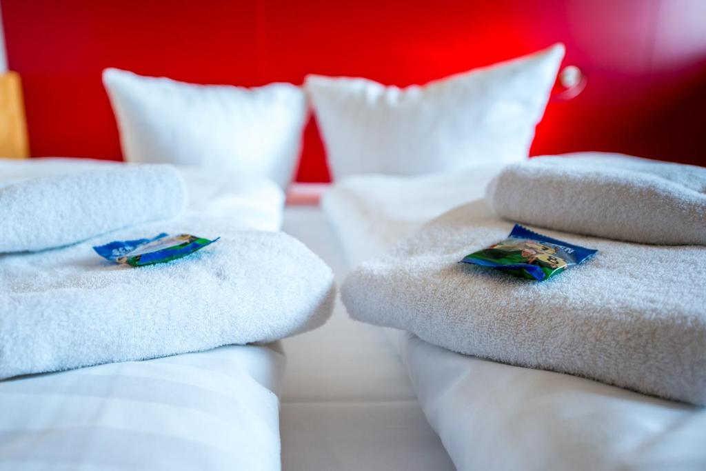 Postel nebo postele na pokoji v ubytování Resort Schloss Auerstedt