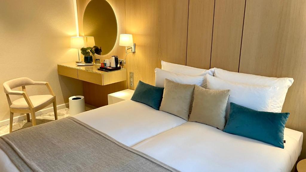 Posteľ alebo postele v izbe v ubytovaní Normafa Hotel & Retreat