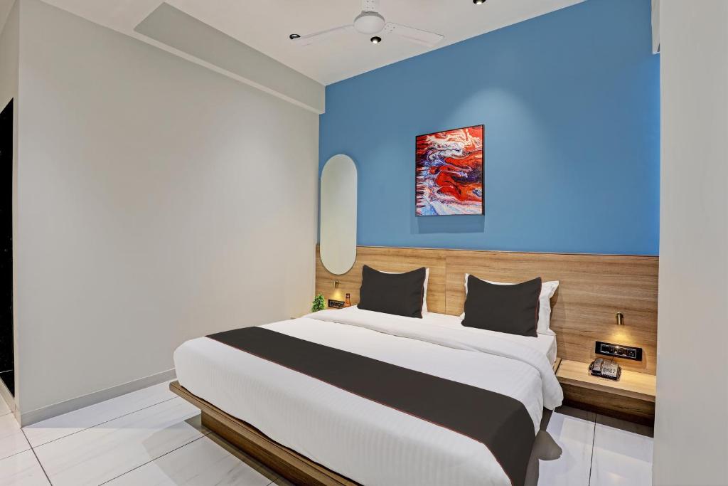 Postel nebo postele na pokoji v ubytování HOTEL LEE PLATINUM