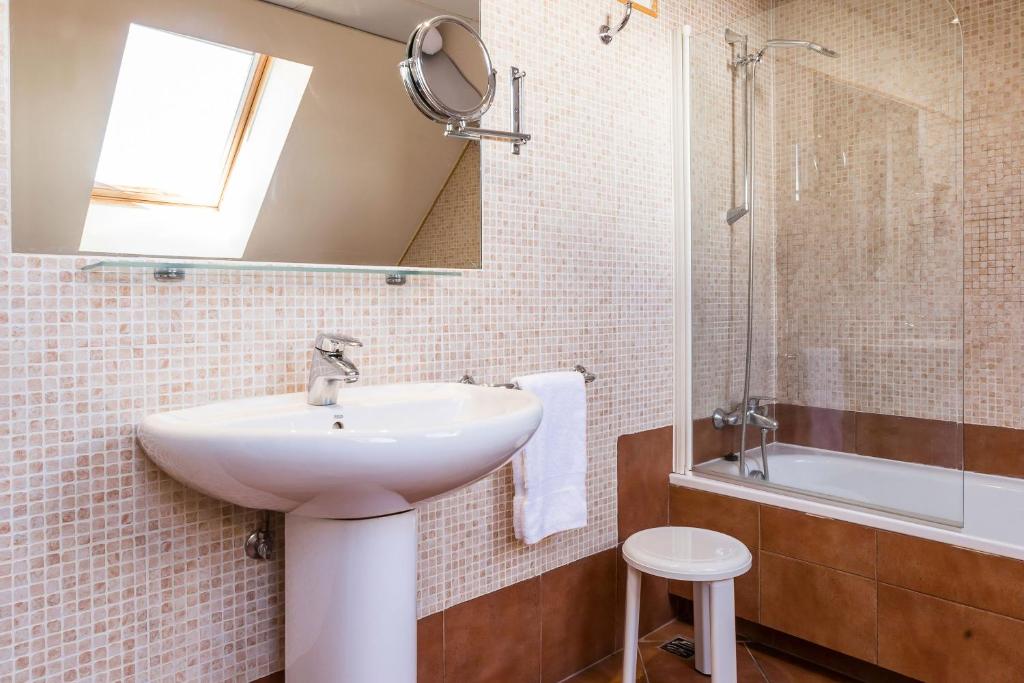 Koupelna v ubytování Hotel Grand Pas